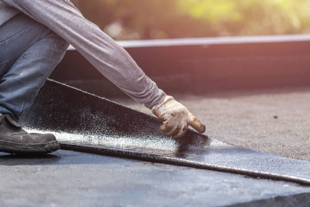 Professional Exterior Waterproofing technician working in West Bloomfield, NY